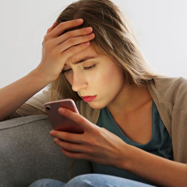 woman staring at her phone (2)