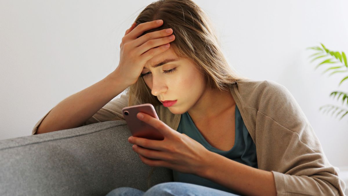 woman staring at her phone (2)