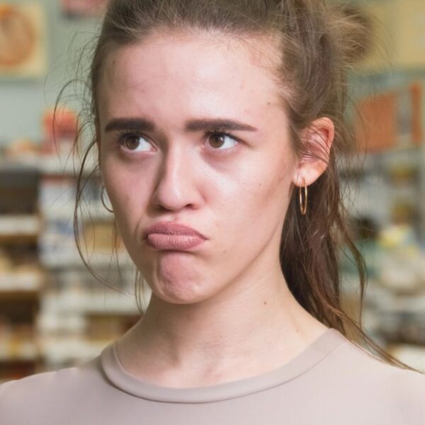 woman stunned at the grocery store