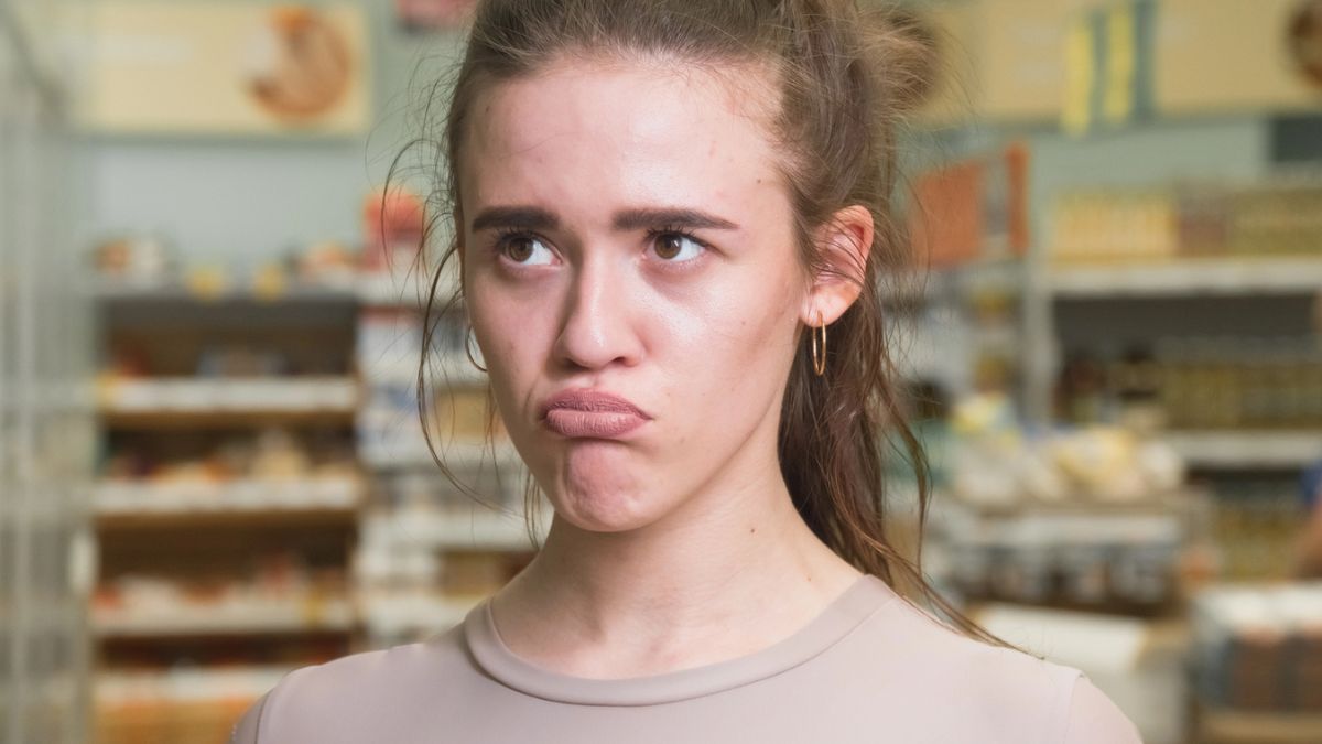 woman stunned at the grocery store