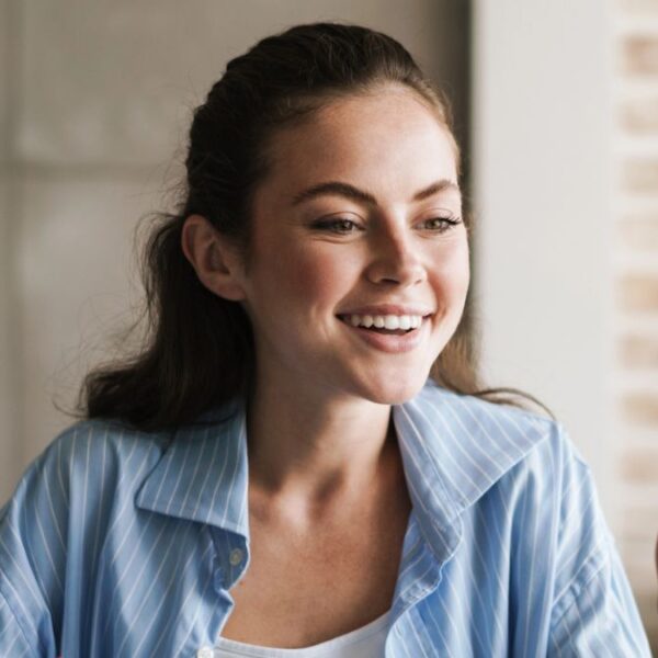 woman talking to her laptop