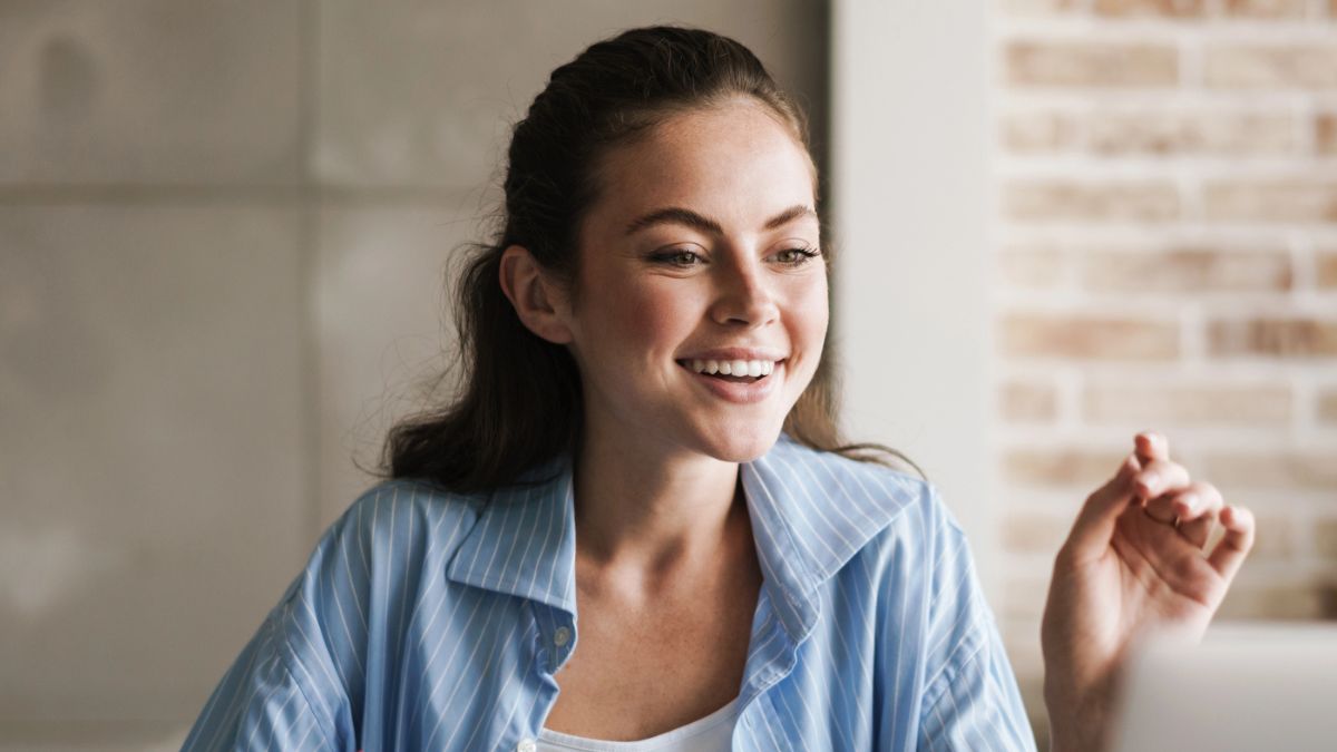 woman talking to her laptop