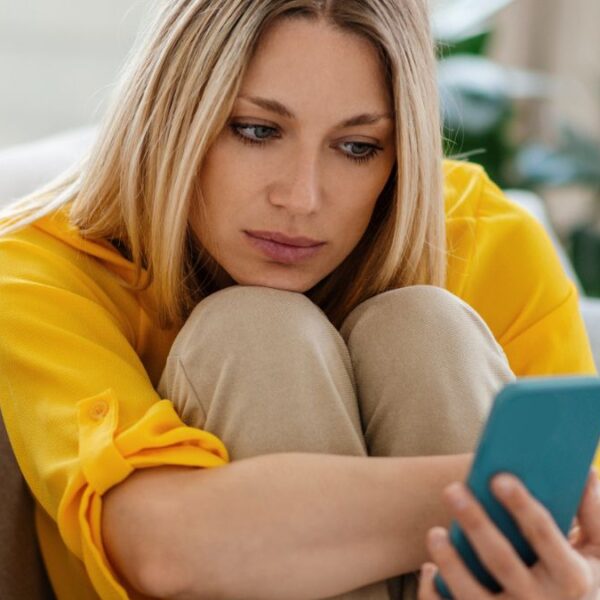 woman texting on the phone