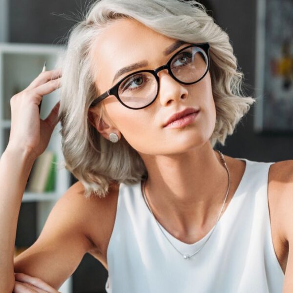 woman working alone glasses