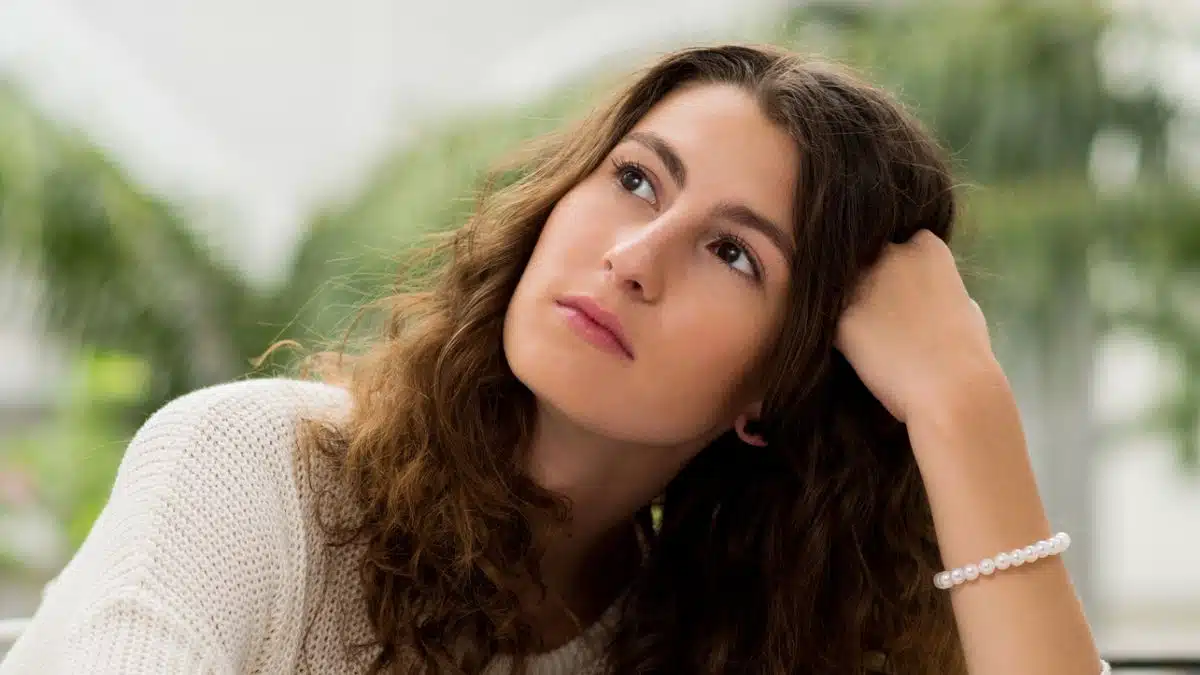 woman writer looking up at the sky