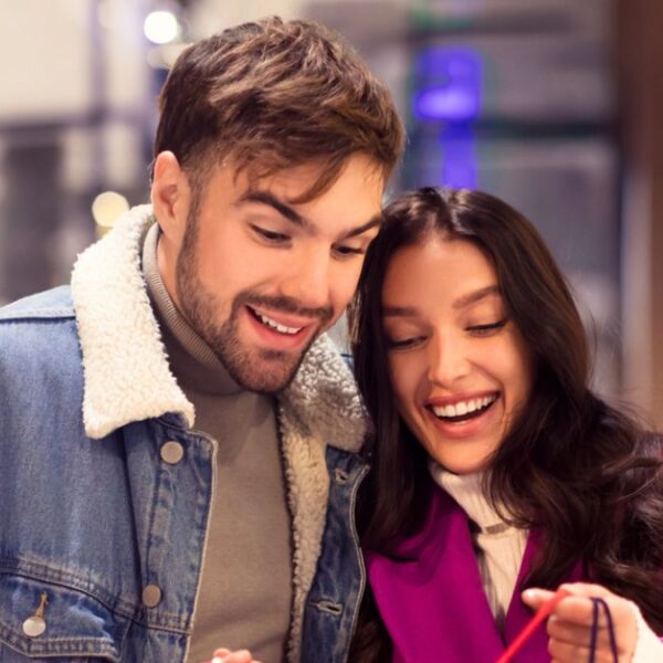 couple looking at shopping bags