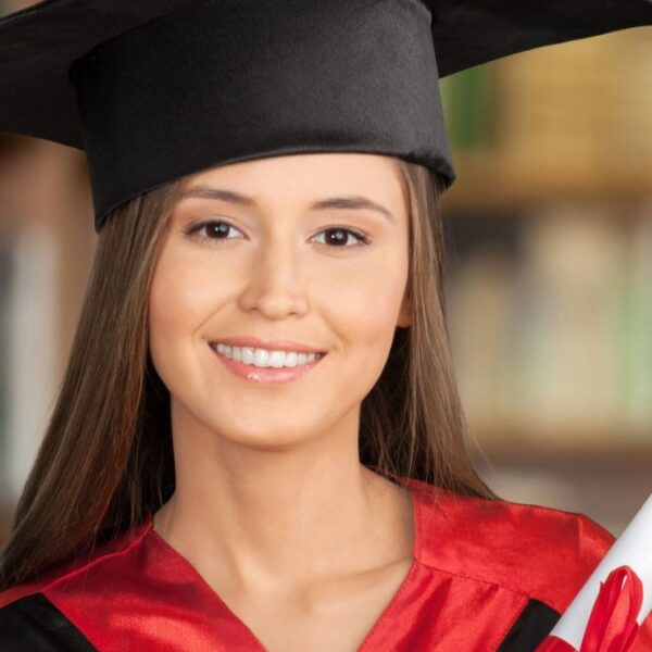 graduate holding degree