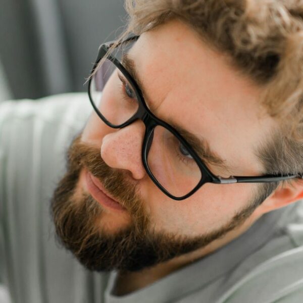 man glasses tech studying