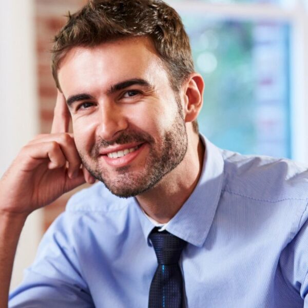 man sitting at a desk