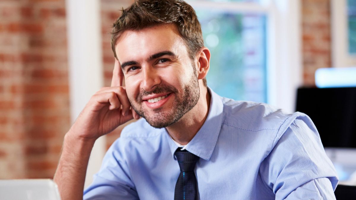 man sitting at a desk