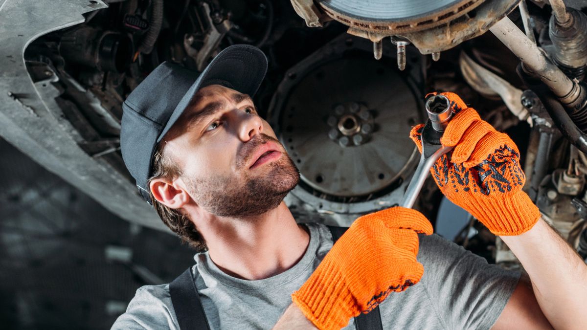 man working under the car