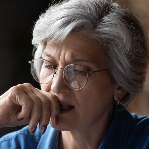mature woman reading mail