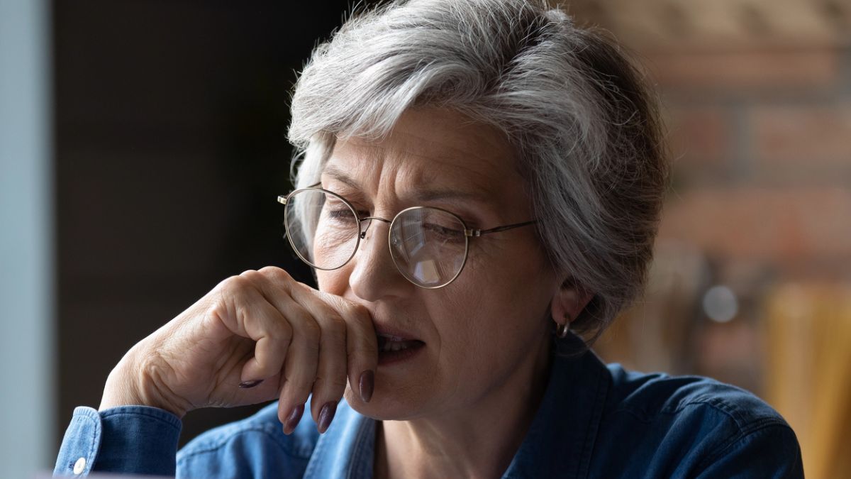 mature woman reading mail