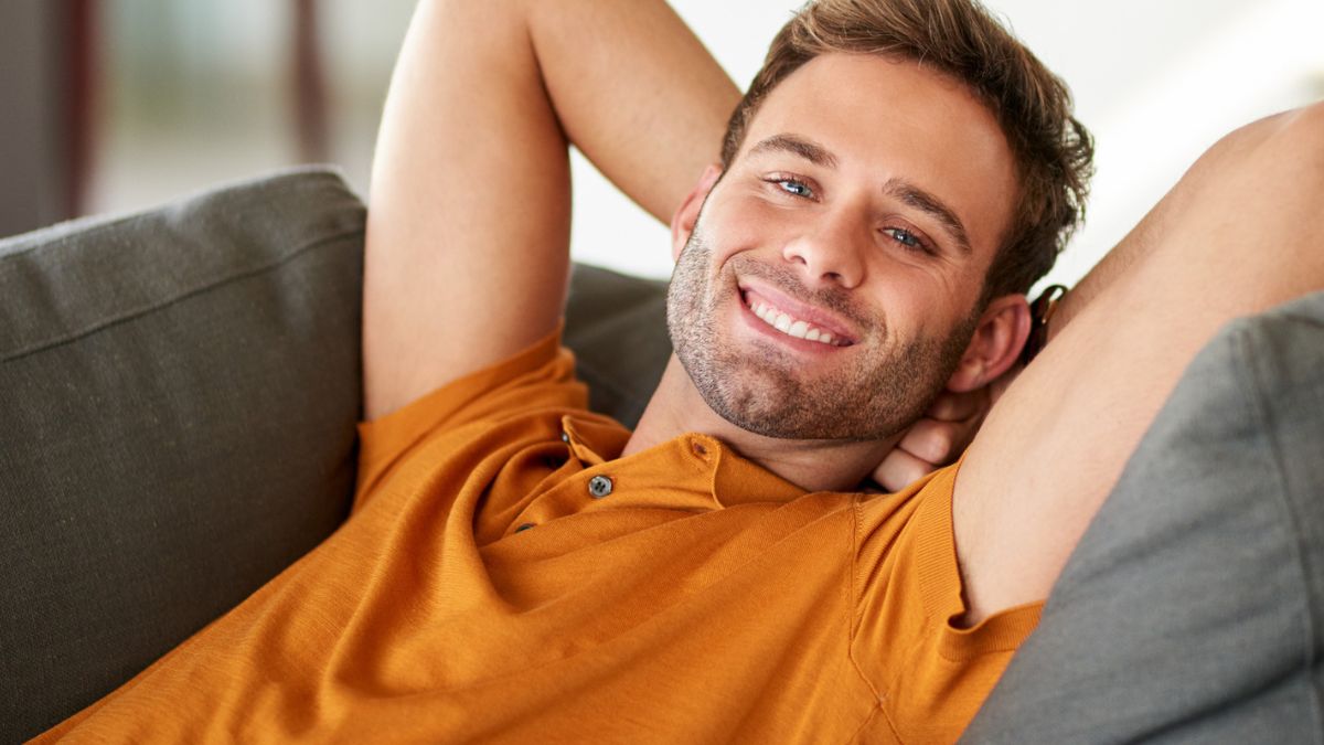 max relaxing on a couch