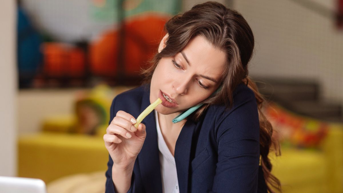 woman eating fries