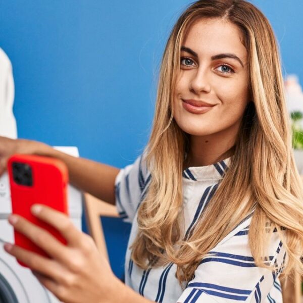 woman in front of washing machine