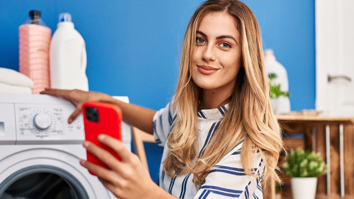 woman in front of washing machine