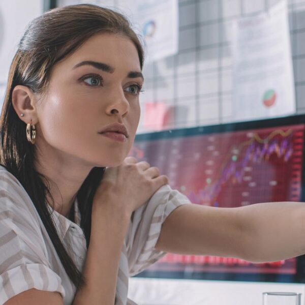 woman looking at computer