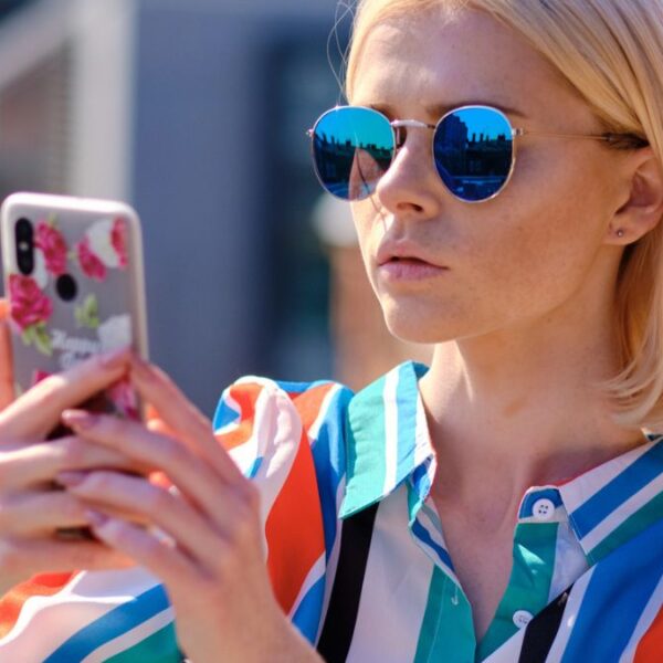 woman looking at her phone