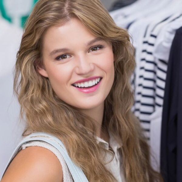 woman next to clothes shopping