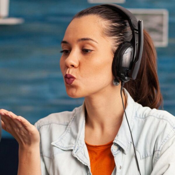 woman on a podcast and microphone
