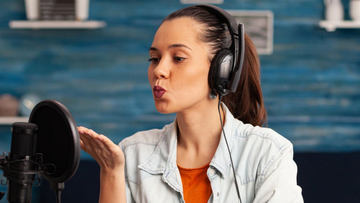 woman on a podcast and microphone