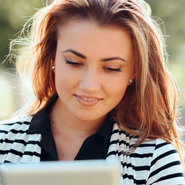 woman reading a tablet