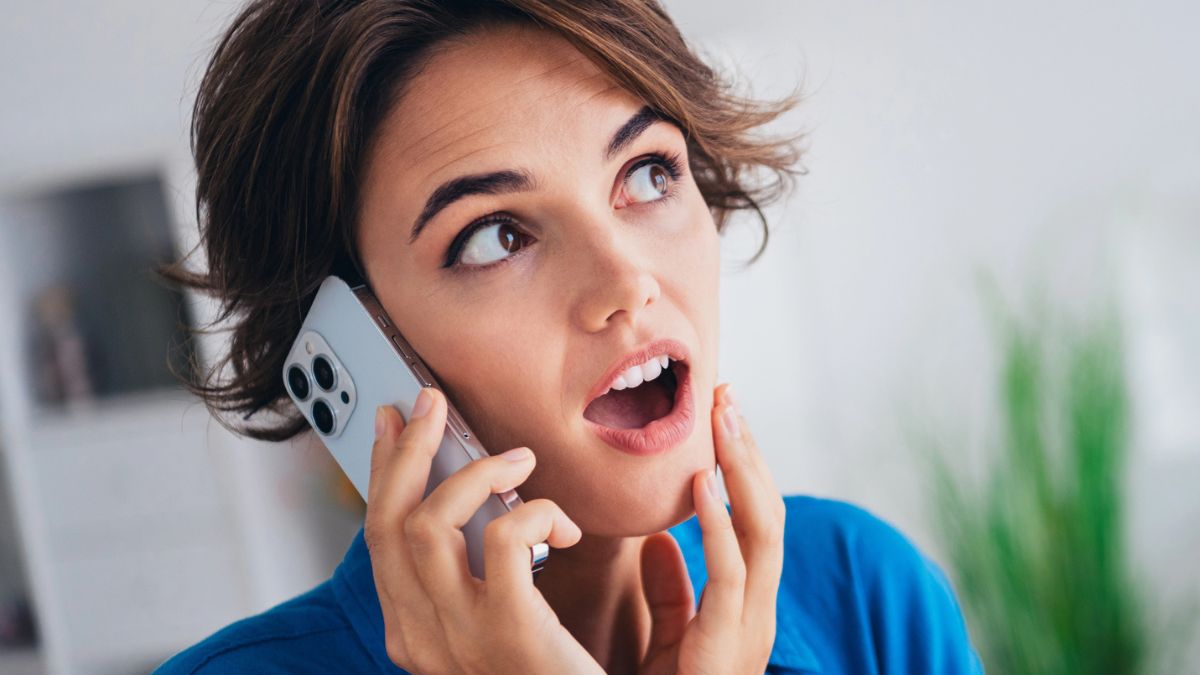 woman shocked on the phone