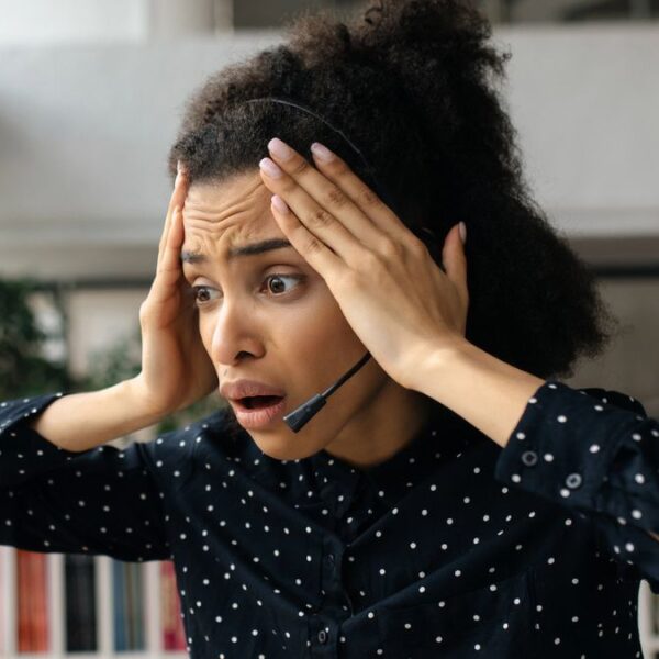 woman shocked with headset
