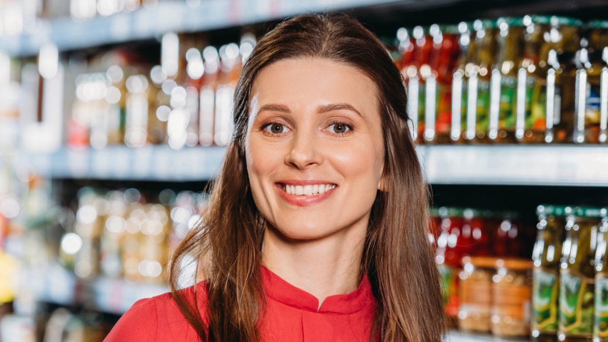 woman smiling in grocery store
