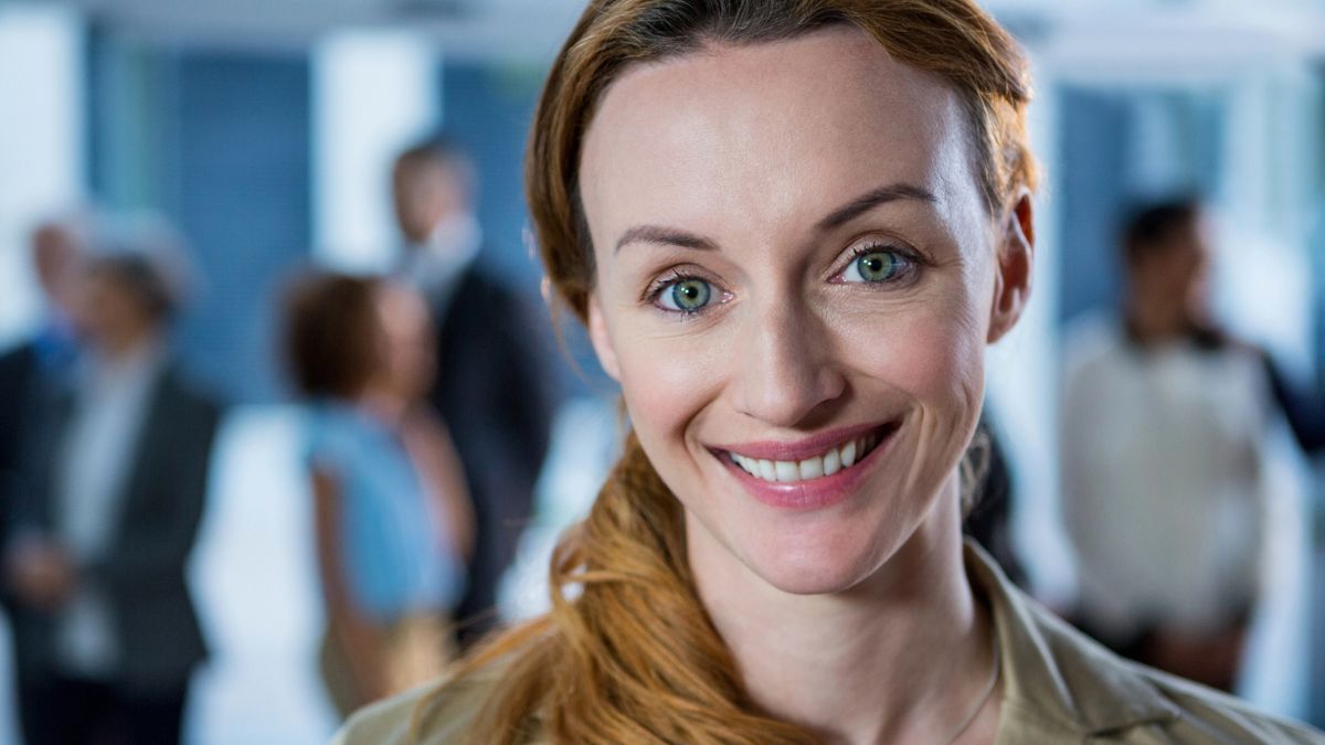 woman smiling in the office (1)