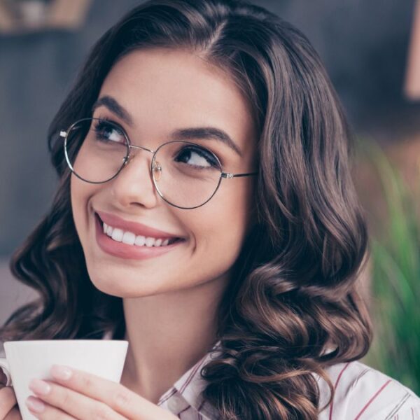 woman smiling with glasses