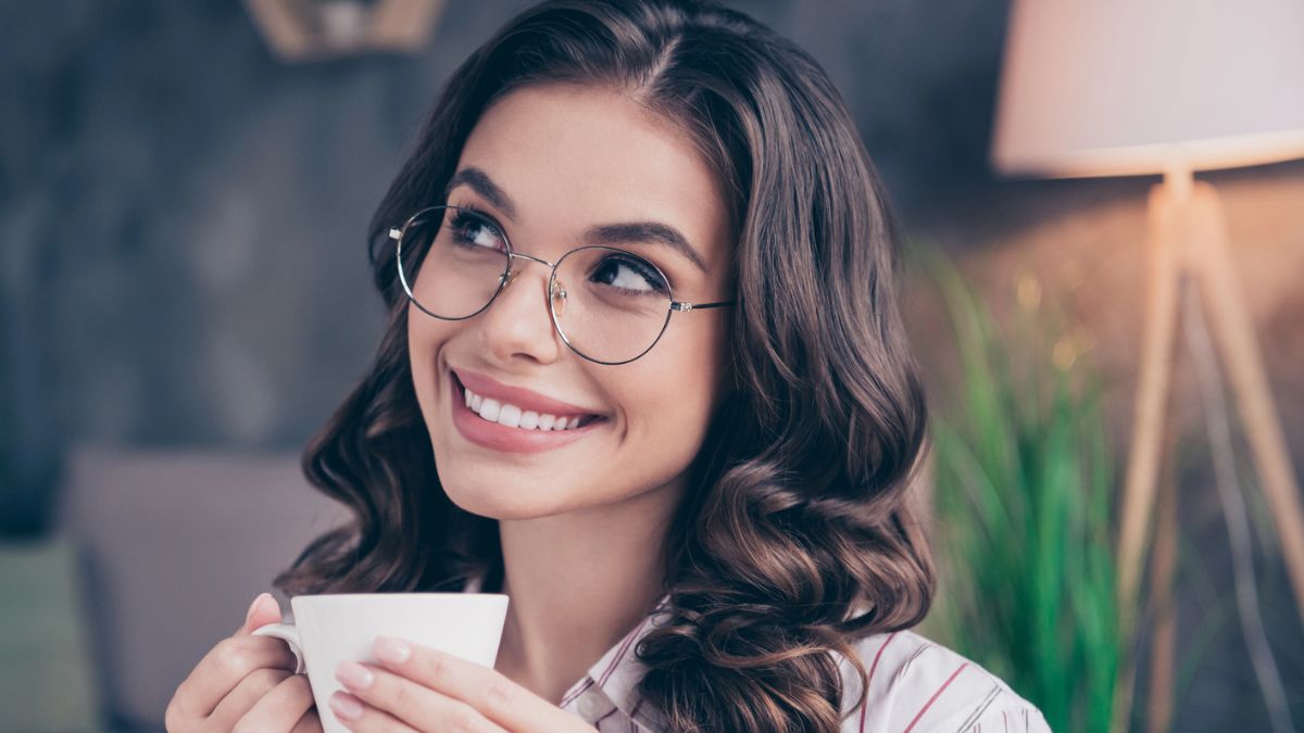 woman smiling with glasses