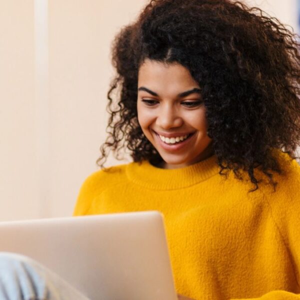 woman smiling with laptop (1)