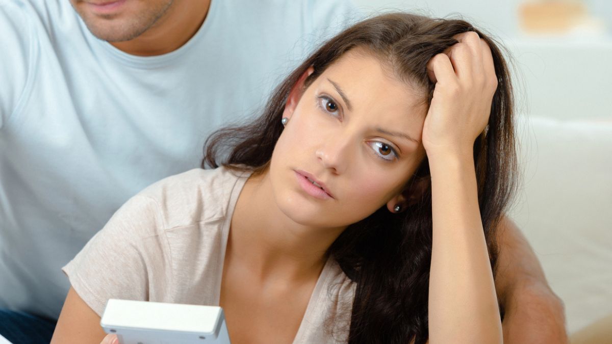 woman staring at product