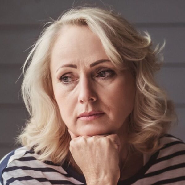 woman thinking to herself mature