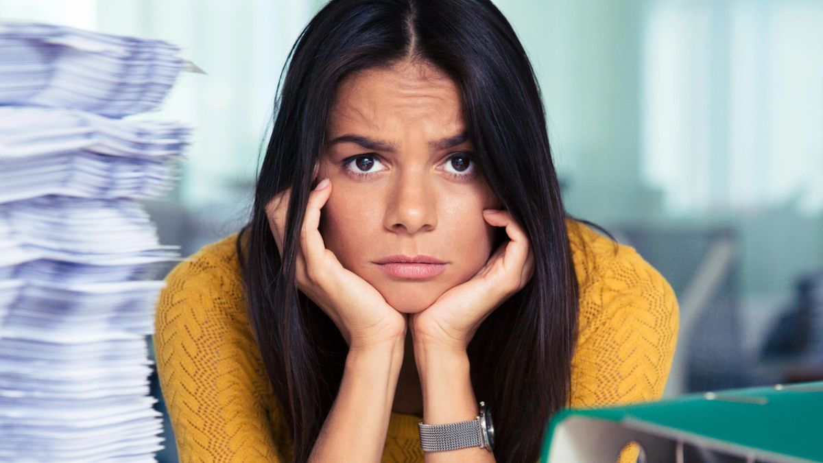 woman upset with paper work