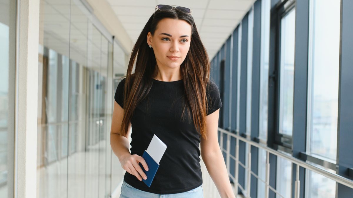 woman walking down the airport