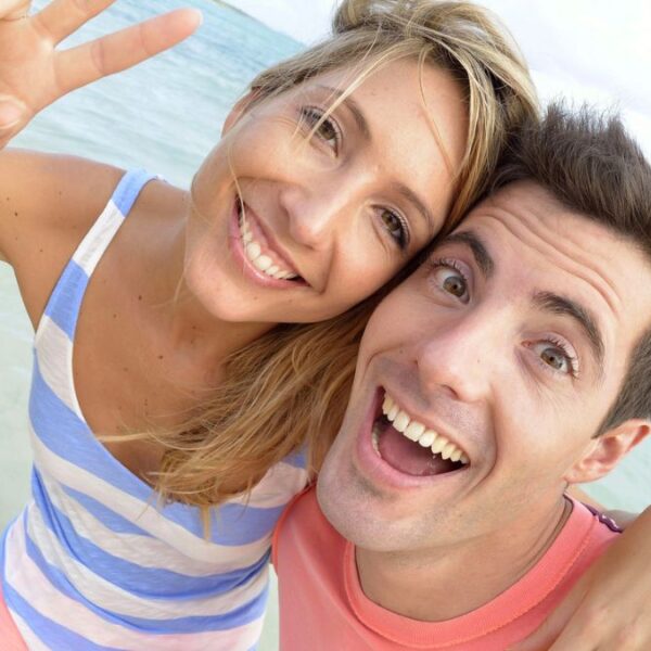 couple smiling at beach