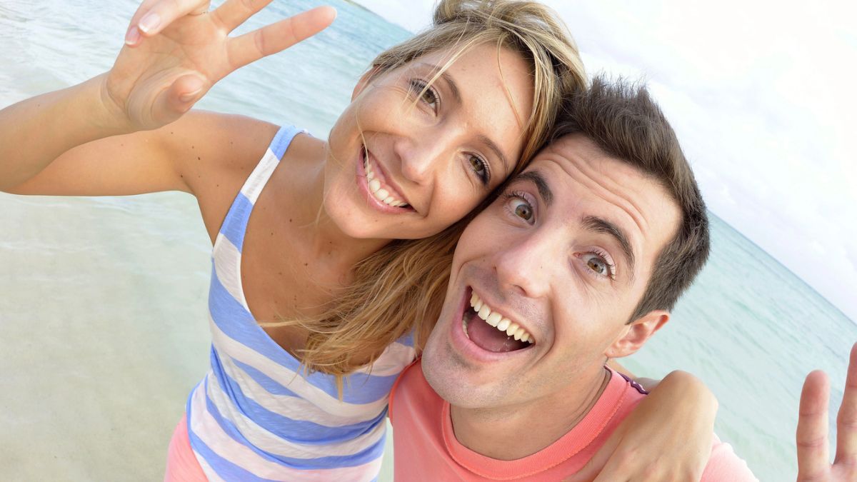 couple smiling at beach