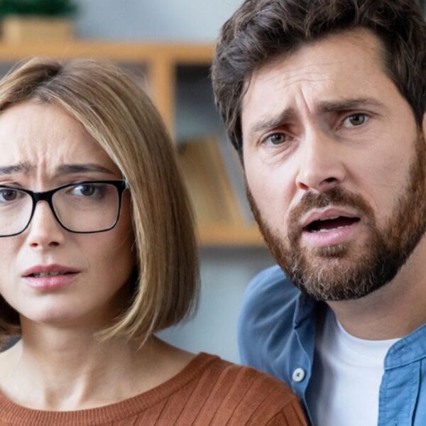couple stunned at home worried