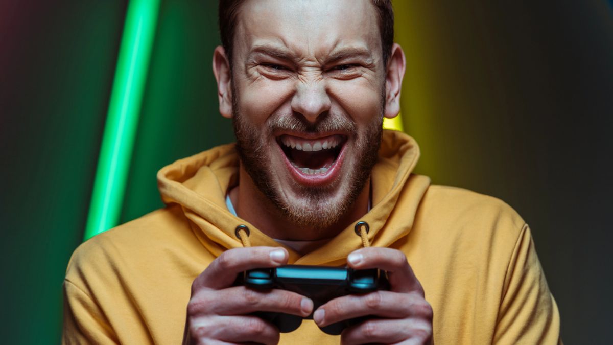 man gaming alone