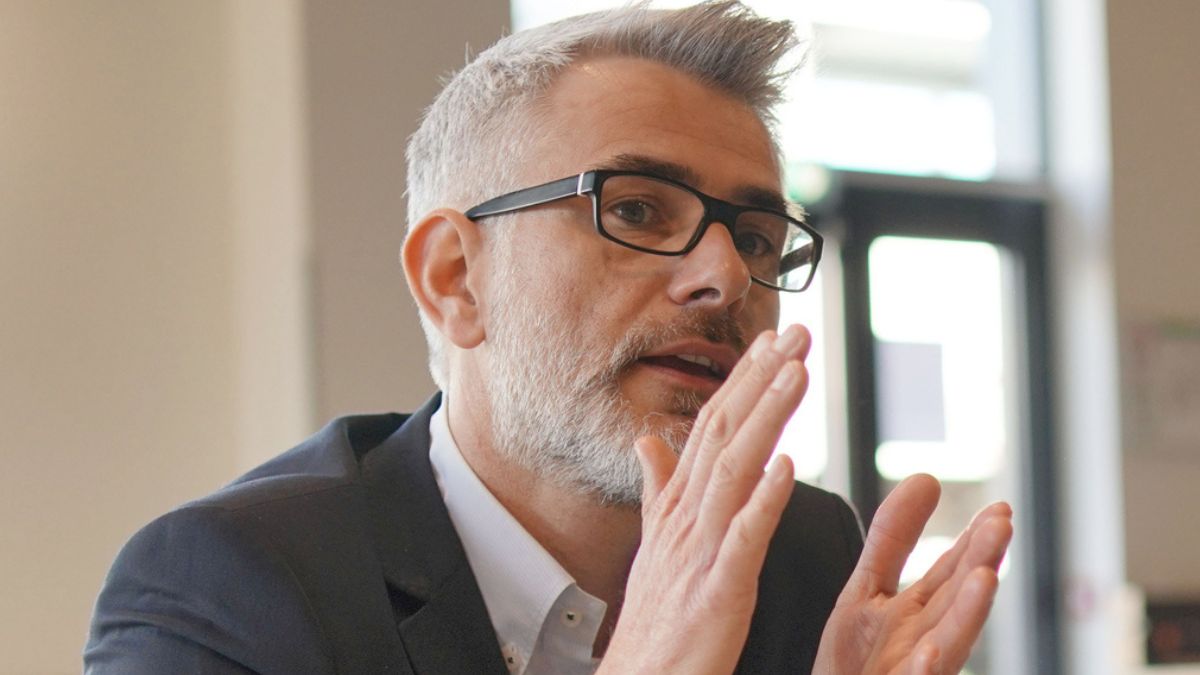 mature man with glasses in an office