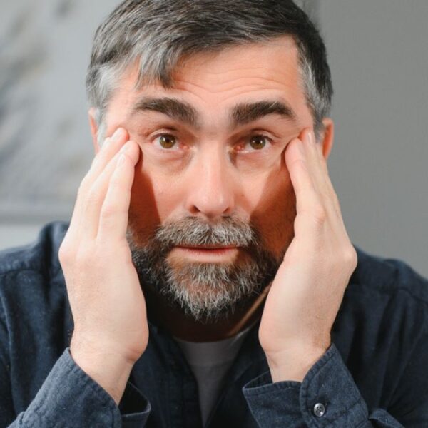 mature man worried and alone