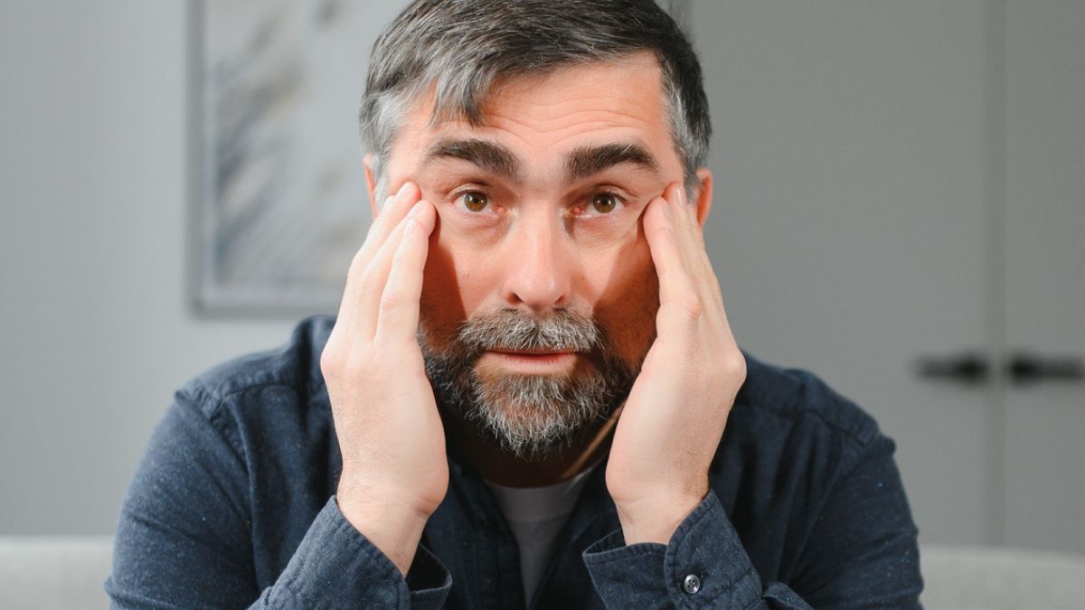mature man worried and alone
