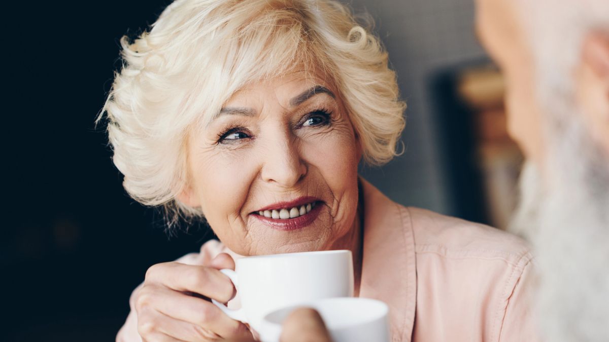 mature woman coffee cup