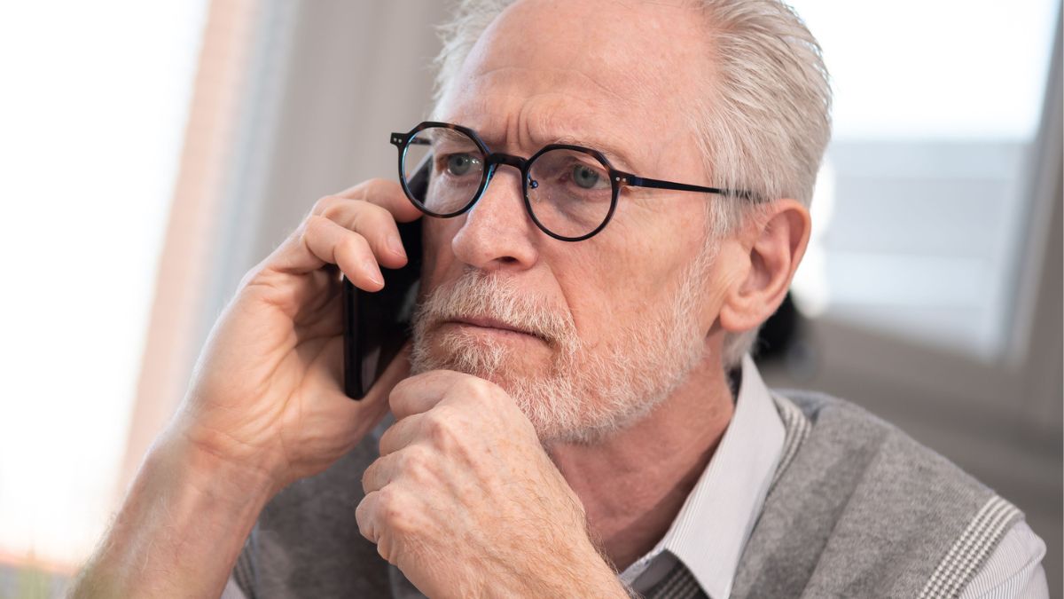 senior man making a phone call