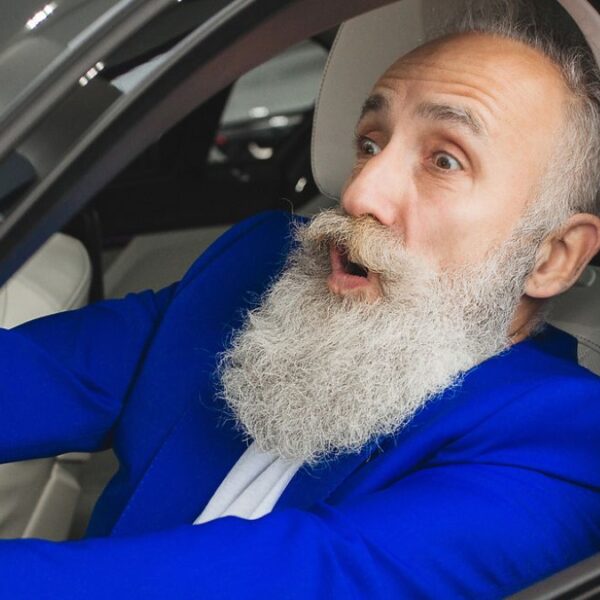 sports car blue suit beard