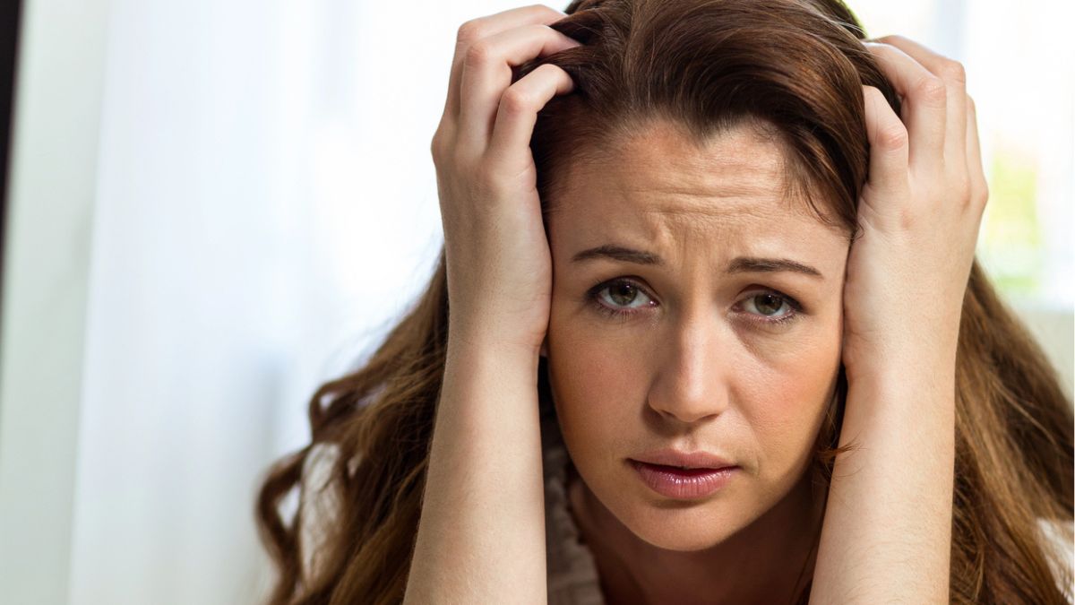 woman confused resting on arm