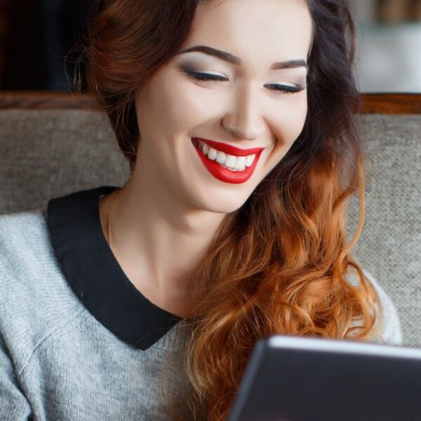 woman looking at a tablet